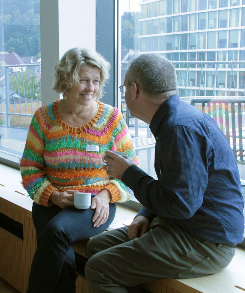 Two people exchanging on the priorities for the EPiC-TLC