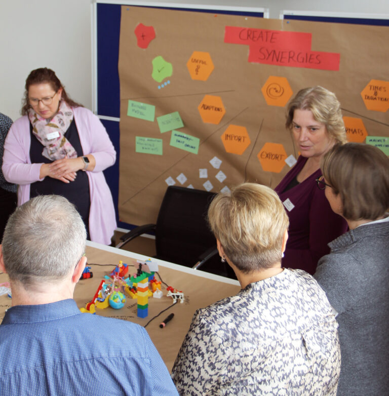 A group of people, talking about creating synergies for the EPiC-TLC programme